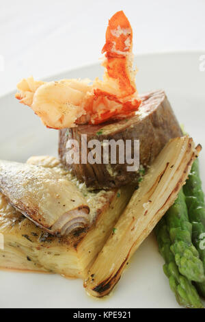 gormet fillet steak surf and truf plated meal Stock Photo