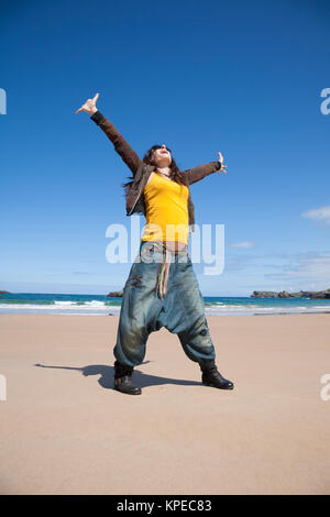 bliss pregnant woman at beach Stock Photo