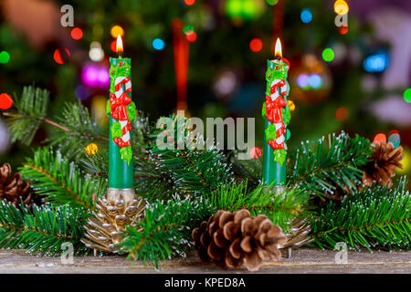 Christmas candles and ornaments over dark background with lights new year of christmas candle Stock Photo