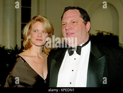 Miramax Films Co-chairman Harvey Weinstein and his wife, Eve Chilton Weinstein, arrive at the White House in Washington, DC for the State Dinner honoring Chinese President Jiang Zemin on October 29, 1997. Credit: Ron Sachs / CNP /MediaPunch Stock Photo