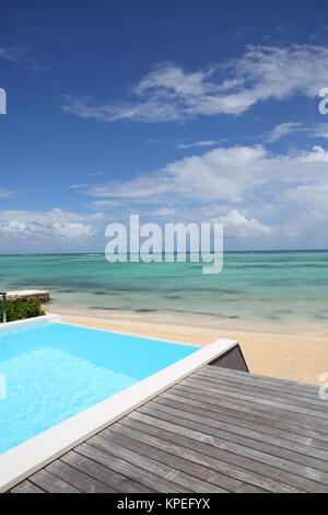 Beautiful view of infinity pool with wooden deck Stock Photo