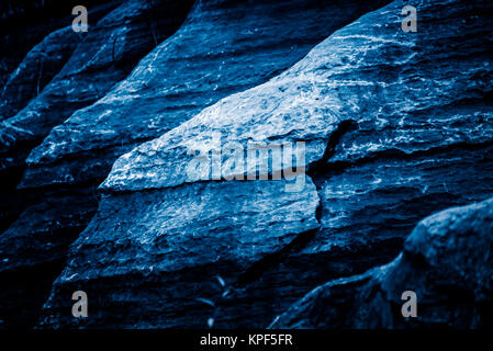 Full Frame Of rocks in blue tone. Stock Photo