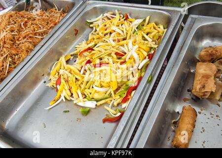 Stainless hotel pans on food warmers with various meals. Roasted meat  pieces with vegetable. Self-service buffet table. Celebration, party,  wedding Stock Photo - Alamy