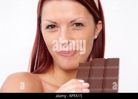 Junge Frau mit einer Tafel Schokolade - woman with chocolate Stock Photo