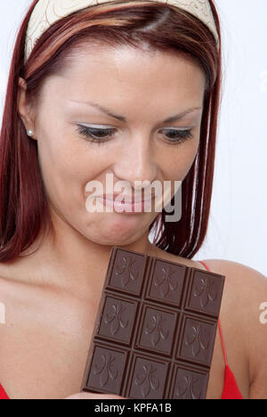 Junge Frau mit einer Tafel Schokolade - woman with chocolate Stock Photo