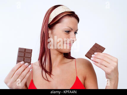 Junge Frau mit einer Tafel Schokolade - woman with chocolate Stock Photo