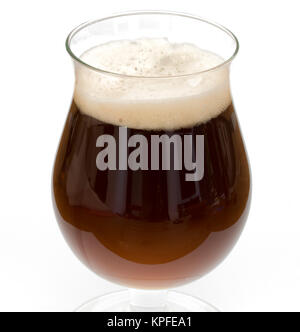 Belgian black beer in chalice glass isolated on white background Stock Photo