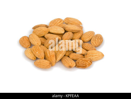 Pile of Roasted almonds nuts isolated on white background Stock Photo