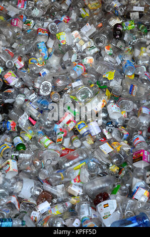Bin full of used clear glass bottles for recycling in Lake Pleasant, NY USA Stock Photo