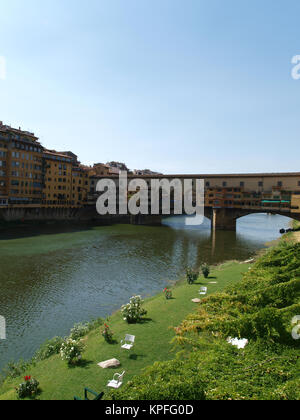 Florence - View of the Ponte Vecchio. The Ponte Vecchio /Old Bridge/ is a Medieval bridge over the Arno River, in Florence, Italy Stock Photo