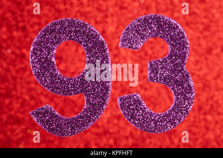 Number ninety-three purple color over a red background. Anniversary. Horizontal Stock Photo