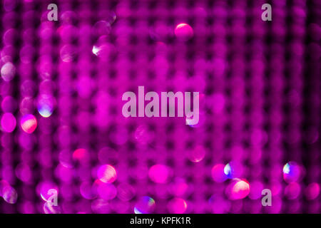 Magenta glitter vintage lights background. defocused Stock Photo