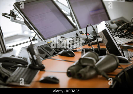 Flight control equipment in the traffic control tower at an airport Stock Photo