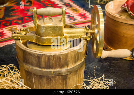 old grinder manual hand mill on the table vintage style Stock Photo