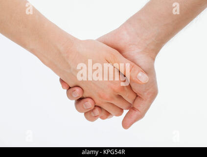 Man's hand gently holding woman's hand Stock Photo
