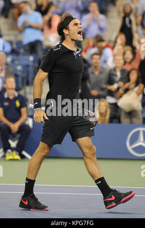 FLUSHING NY- SEPTEMBER 04: Roger Federer defeats Gael Monfils Day ten of the 2014 US Open at the USTA Billie Jean King National Tennis Center on September 3, 2014 in the Flushing neighborhood of the Queens borough of New York City   People:  Roger Federer Stock Photo