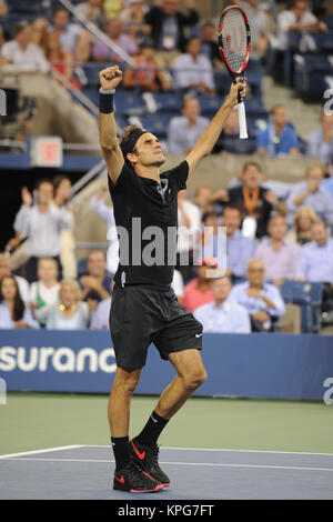 FLUSHING NY- SEPTEMBER 04: Roger Federer defeats Gael Monfils Day ten of the 2014 US Open at the USTA Billie Jean King National Tennis Center on September 3, 2014 in the Flushing neighborhood of the Queens borough of New York City   People:  Roger Federer Stock Photo