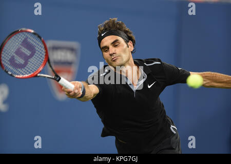 FLUSHING NY- SEPTEMBER 04: Roger Federer defeats Gael Monfils Day ten of the 2014 US Open at the USTA Billie Jean King National Tennis Center on September 3, 2014 in the Flushing neighborhood of the Queens borough of New York City   People:  Roger Federer Stock Photo