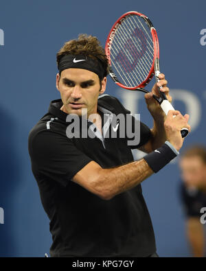 FLUSHING NY- SEPTEMBER 04: Roger Federer defeats Gael Monfils Day ten of the 2014 US Open at the USTA Billie Jean King National Tennis Center on September 3, 2014 in the Flushing neighborhood of the Queens borough of New York City   People:  Roger Federer Stock Photo