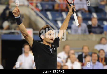 FLUSHING NY- SEPTEMBER 04: Roger Federer defeats Gael Monfils Day ten of the 2014 US Open at the USTA Billie Jean King National Tennis Center on September 3, 2014 in the Flushing neighborhood of the Queens borough of New York City   People:  Roger Federer Stock Photo