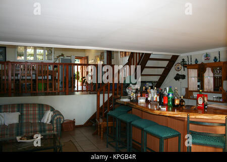 The bar area inside a house on the golf estate at White River, Mpumalanga Stock Photo