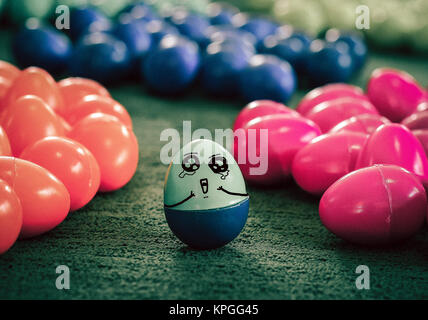 alone lonely concept, painted at plastic egg. Stock Photo