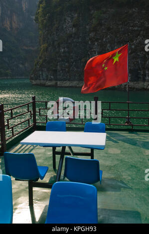 CHINA, Chongqing Province, Wushan. Riverboat Deck and Chinese Flag at the Little Three Gorges Staging Point. Stock Photo