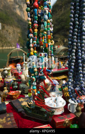 CHINA, Chongqing Province, Wushan. Riverboat Port at Little Three Gorges Staging Point-Tourist Souvenirs. Stock Photo