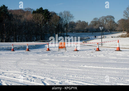 Road closed in the Phoenix Park in Dublin after a heavy snow fall on a beautiful winter morning on the first day of the New Year 2010 Stock Photo