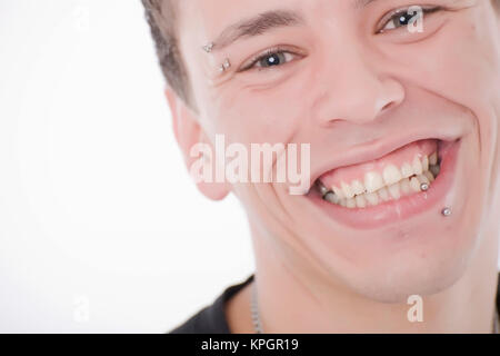 Model released , Junger Mann, 27, mit Gesichtspiercings - man with face piercings Stock Photo