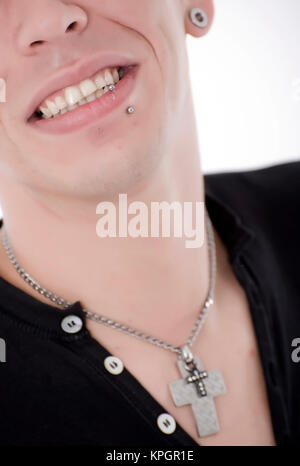 Model released , Junger Mann, 27, mit Gesichtspiercings - man with face piercings Stock Photo