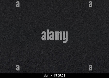 Dark black background with shiny color speckles Stock Photo