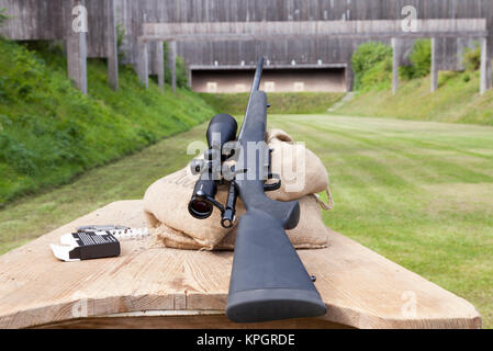 sniper rifle on gun range Stock Photo