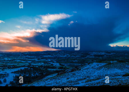 Sunset with storm cloud over the Vale of Clwyd. Stock Photo