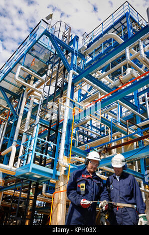 Oil And Gas Workers Inside Refinery Stock Photo Alamy