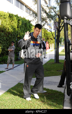 MIAMI, FL - FEBRUARY 23:  (EXCLUSIVE COVERAGE) here is a rare picture of New York Knicks guard Jeremy Lin out of uniform. Lin, who has rejuvenated the New York Knicks with his play and even his own catch phrase “Linsanity.,' has ignited New York and the world. Jeremy Lin is pictured here leaving his Miami Hotel where he refused to sign autographs or speak to fans who waited hours to get a glimpse of the young star.  Jeremy Shu-How Lin (born August 23, 1988) is an American professional basketball player with the New York Knicks of the National Basketball Association (NBA). After receiving no at Stock Photo