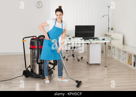 Hand washing and cleaning window with professionally squeegee portable  vacuum cleaner. Maid cleans window Stock Photo - Alamy