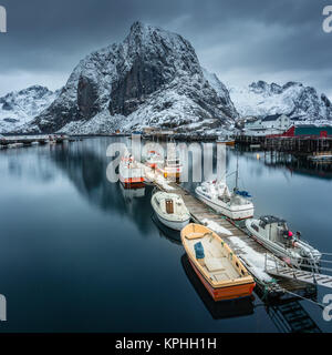 Fishing boats at dusk in Hamnoy, Lofoten, Norway Stock Photo