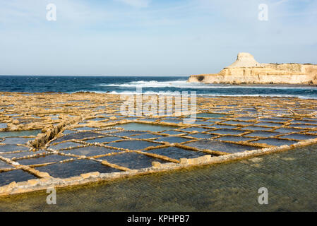 Salt Pans on the coast at Qbajjar  near Marsalforn Bay Bay Gozo Malta Stock Photo