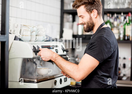 Barista making coffee Stock Photo