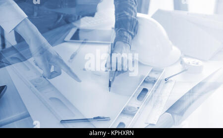 Close up Architects Hands Working with Engineering on blueprint background Stock Photo