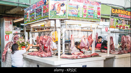 Lima, Peru - October 13, 2014 - A little store selling meat in the Mercado de Surquillo in Lima (Peru) Stock Photo