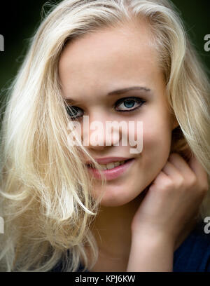 Beautiful Young Blond Teenage Girl Wearing Make-up Stock Photo