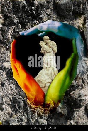 A couple in a heart with three painted hands Stock Photo