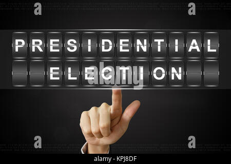 business hand clicking presidential election on Flipboard Stock Photo