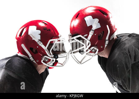 The two american football players fighting on white background Stock Photo