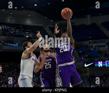 Saturday Dec 16th - Northwestern Wildcats guard Scottie Lindsey (20) puts up a shot during NCAA Mens basketball game action between the Northwestern Wildcats and the DePaul Blue Demons at the Windtrust Arena in Chicago, IL.