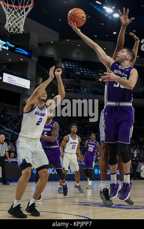 Saturday Dec 16th - Northwestern Wildcats guard Bryant McIntosh (30) puts up a shot during NCAA Mens basketball game action between the Northwestern Wildcats and the DePaul Blue Demons at the Windtrust Arena in Chicago, IL.