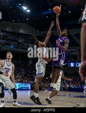 Saturday Dec 16th - Northwestern Wildcats forward Vic Law (4) puts up a shot during NCAA Mens basketball game action between the Northwestern Wildcats and the DePaul Blue Demons at the Windtrust Arena in Chicago, IL.