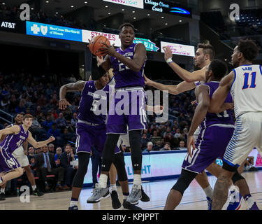 Saturday Dec 16th - Northwestern Wildcats guard Scottie Lindsey (20) comes down with a rebound during NCAA Mens basketball game action between the Northwestern Wildcats and the DePaul Blue Demons at the Windtrust Arena in Chicago, IL.